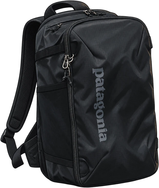 Black Patagonia Mini MLC backpack resting on a seat