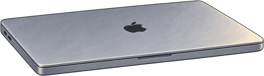 Closed silver MacBook Pro resting on a seat